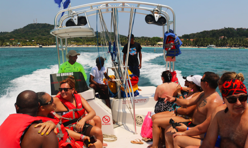 west bay beach roatan parasailing